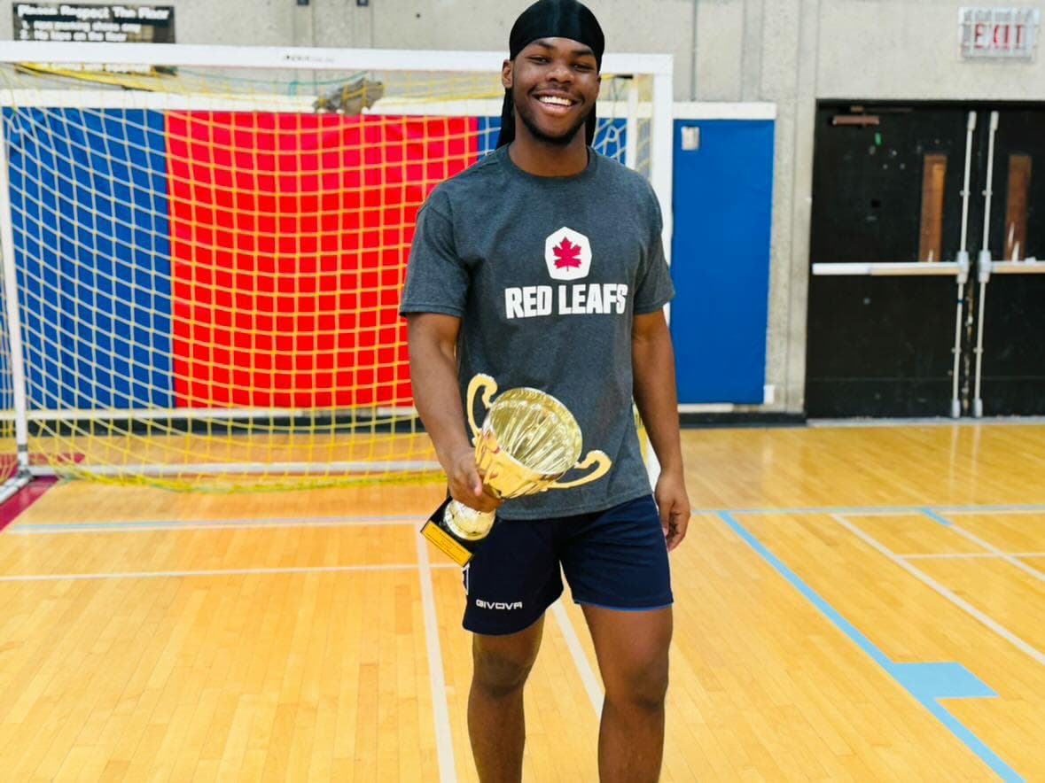 Maxime with the Futsal trophy
